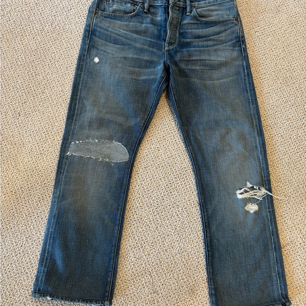 Distressed Blue Jeans